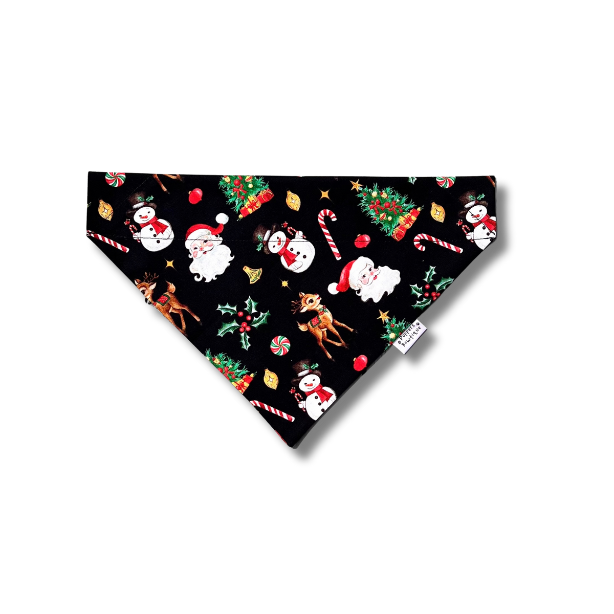 A triangular pet bandana with a black background and a festive Christmas print featuring Santa Claus, snowmen, reindeer, candy canes, and holly, shown on a plain white background.